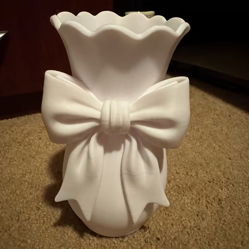 Decorative White Plastic Vase with Sculpted Bow Detail