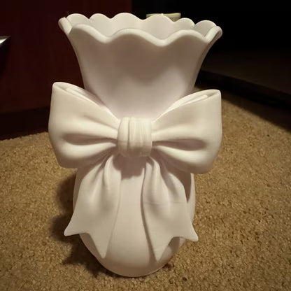 Decorative White Plastic Vase with Sculpted Bow Detail